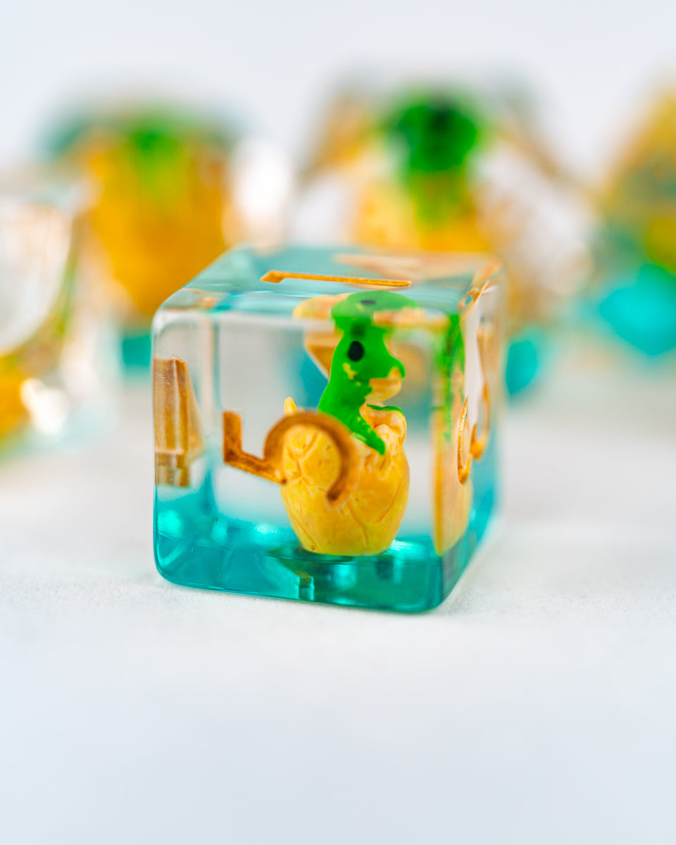 Chomper | Dino Egg | 7 Piece Acrylic Inclusion Dice Set