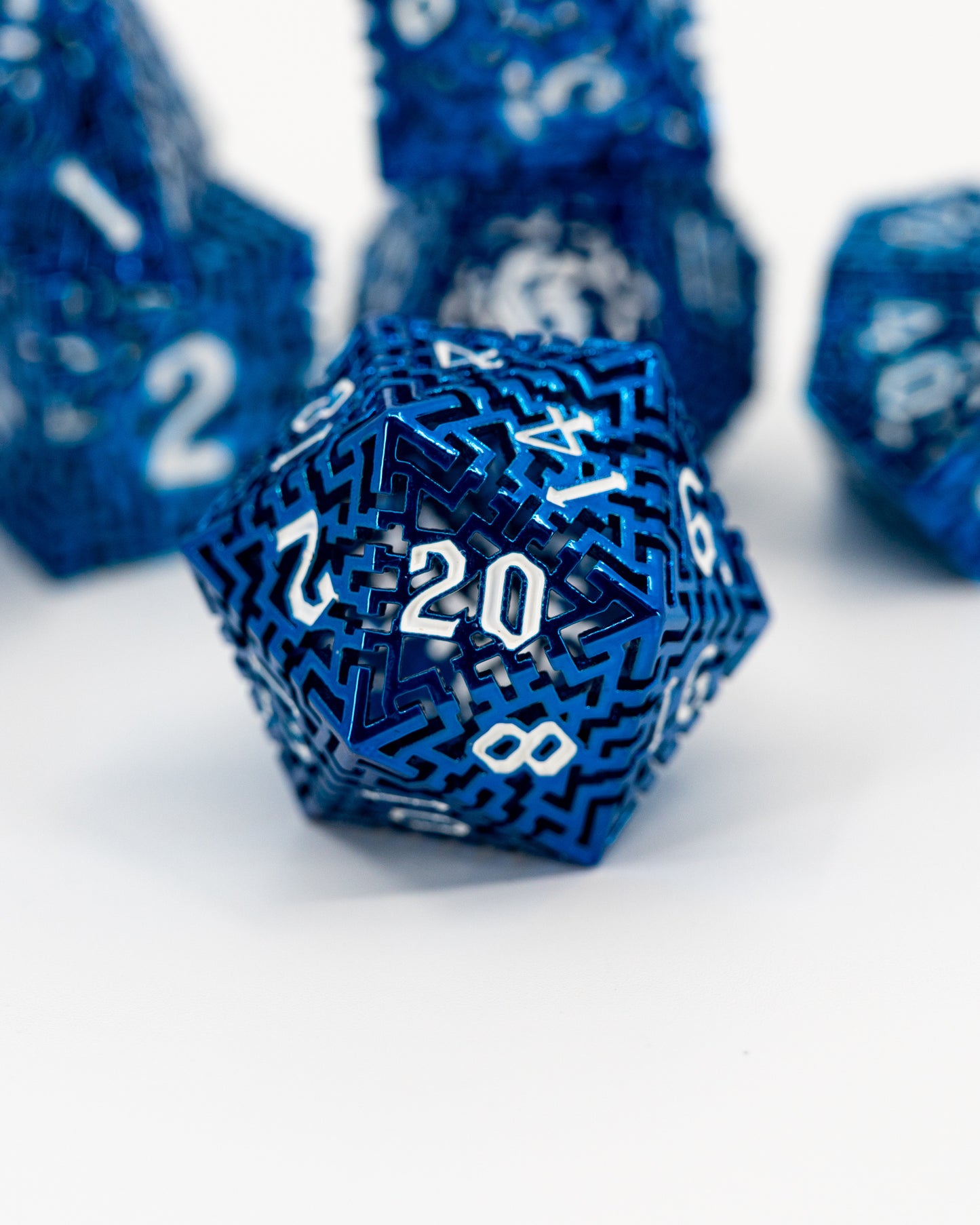 Trojaborg | Hollow Maze | 7 Piece Metal Dice Set